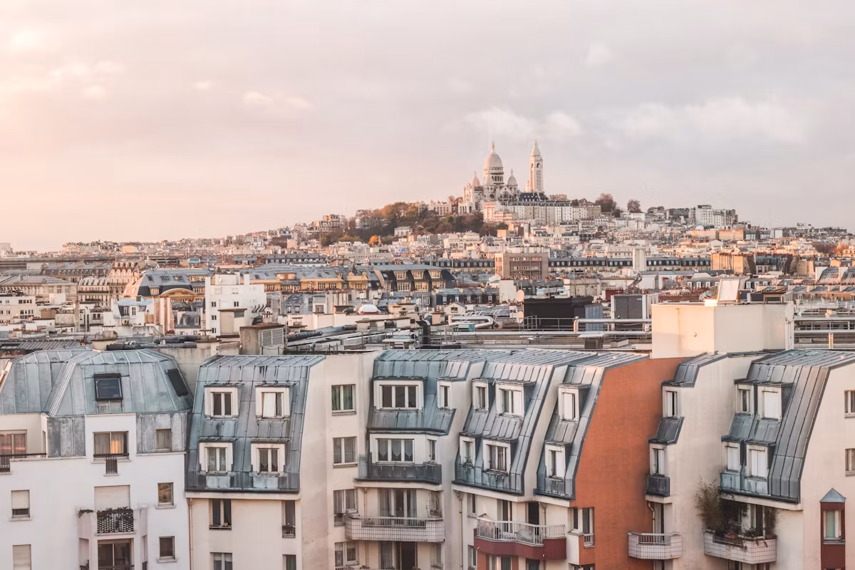Zinc rooftops rolling up to Sacré-Cœur on Montmartre