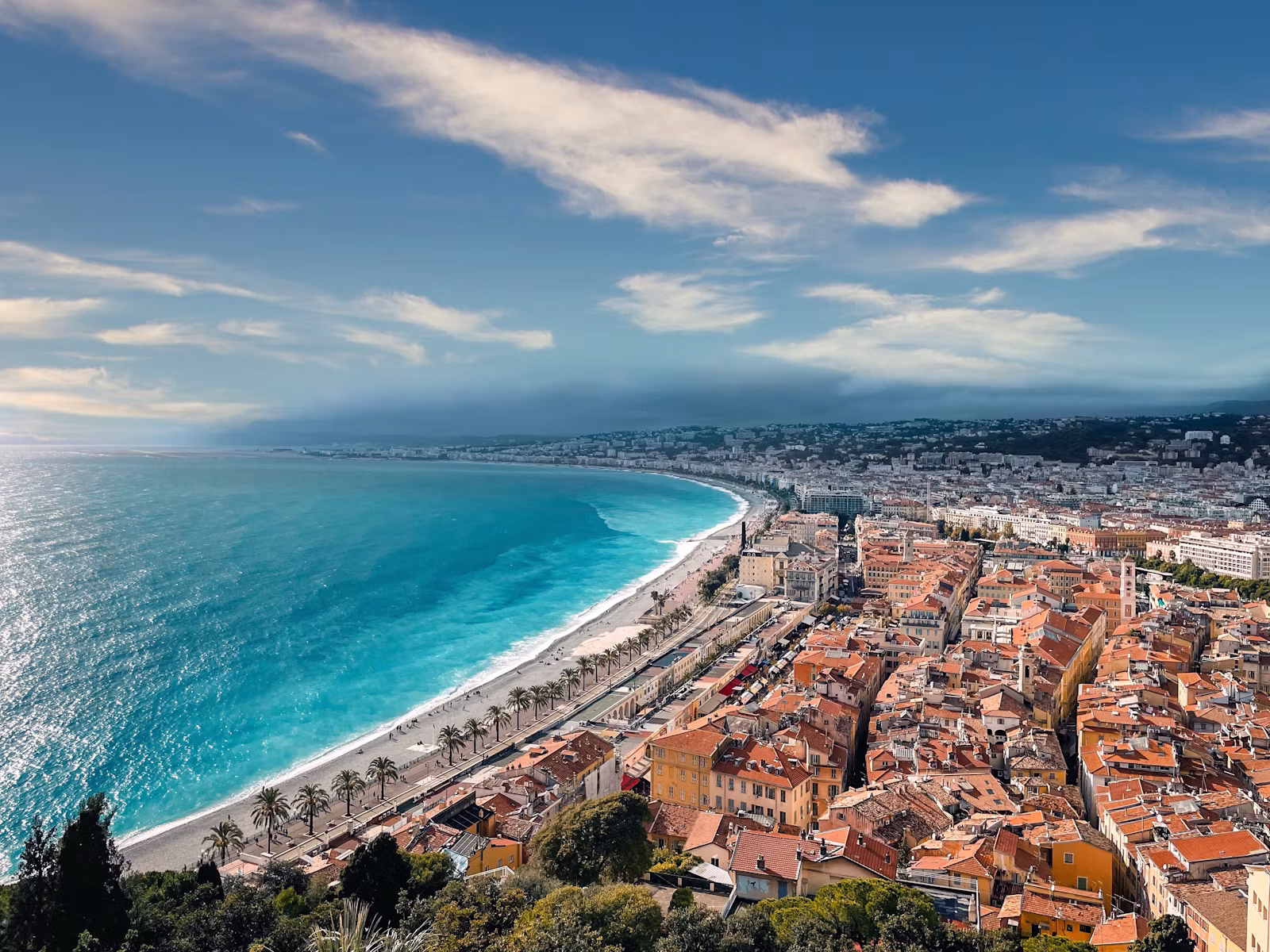 The Baie des Anges and the roofs of Nice seen from the castle hill