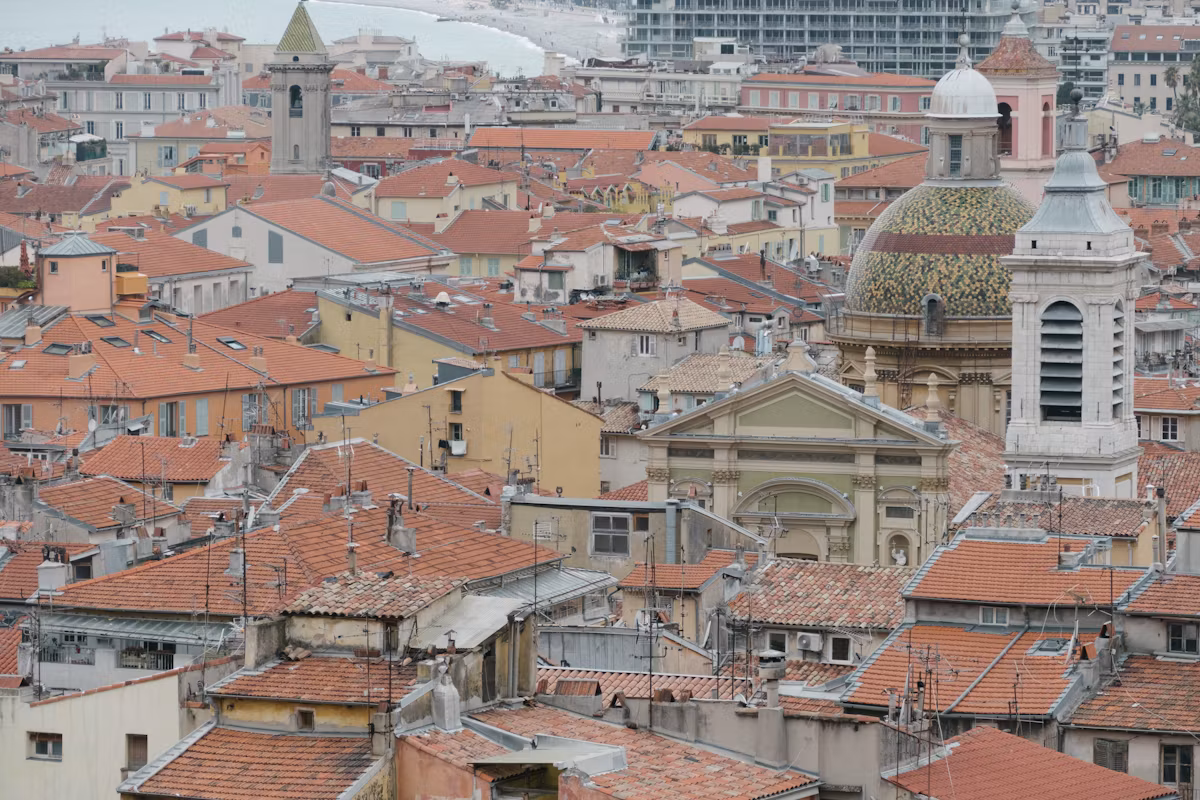 Terracotta roofs and a bell tower in the old town of Nice